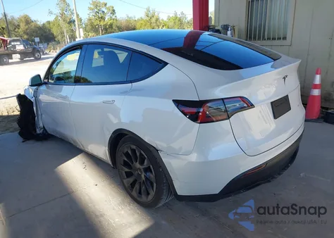 2022 Tesla Model Y Long Range Dual Motor All-Wheel Drive z USA, uszkodzony, nr VIN 7SAYGDEE4NF325837